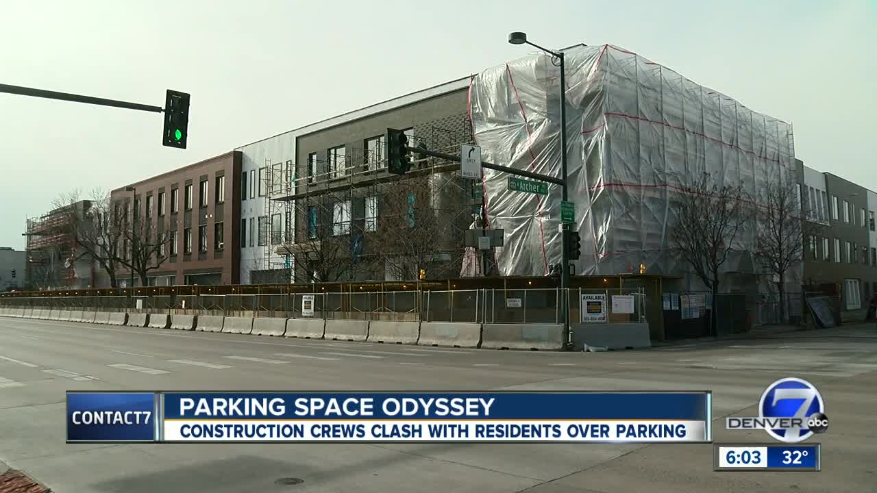 Residents complain that construction crews are taking over neighborhood and saving parking spots