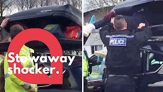 Police crack open car roof box and discover stowaway hiding inside