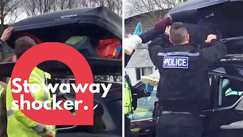 Police crack open car roof box and discover stowaway hiding inside