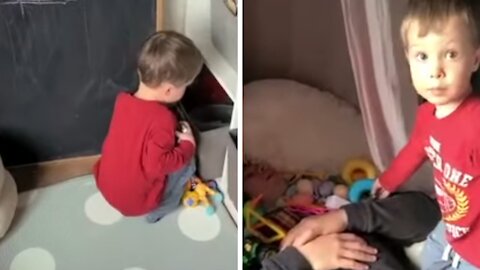 Dad falls asleep in kid's bed who stacks toys on him