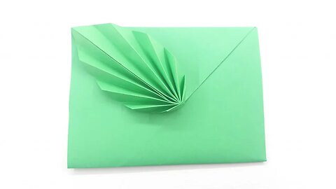 Origami paper leaf envelope with Ski