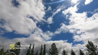 Timelapse shows clear blue skies turn into gloomy storm clouds