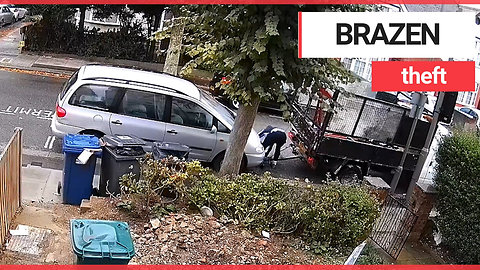 Brazen thieves caught stealing parked car by towing it away in broad daylight