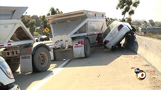 Crash leaves car wedged above SR-94