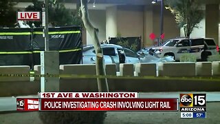 Car crashes into lightrail at 1st Avenue and Washington