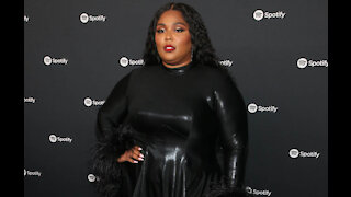 Lizzo drunkenly slid into Chris Evans' direct messages - and he responded!