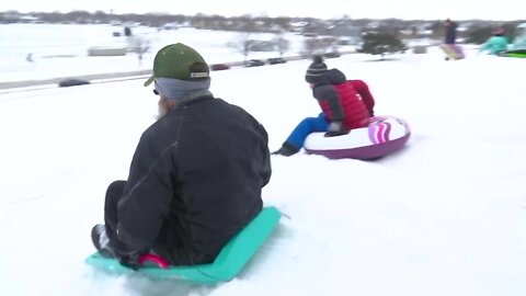 Sledders take over Oshkosh's Red Arrow Park during snow day