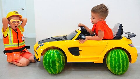 Vlad change wheels Nikita toy car.
