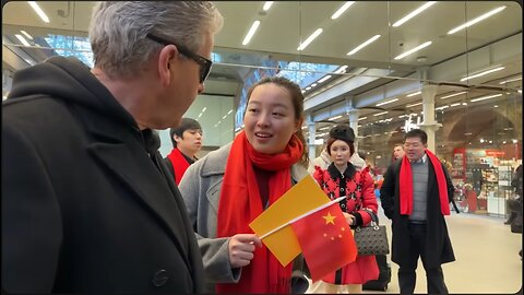 Chinese Commies Don't Want To Be On Video. Stick Dumb Faces In Camera. Goes Viral