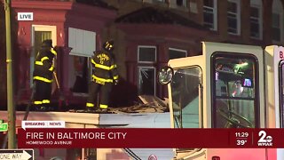 One person is dead following a two-alarm row home fire in East Baltimore
