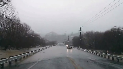 Driving through flooded roads in New Zealand