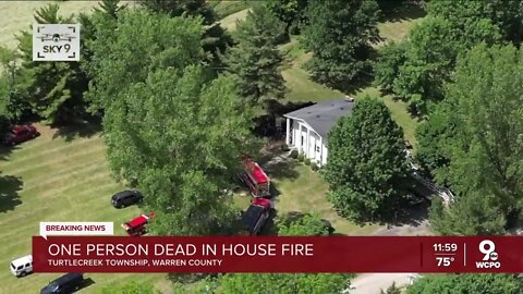 One person dead in house fire, another treated after trying to save them