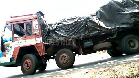 truck driving at Dhimbam ghat road bus driver taking side in hairpin bend Road