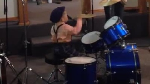 Two-year-old baby plays drums flawlessly