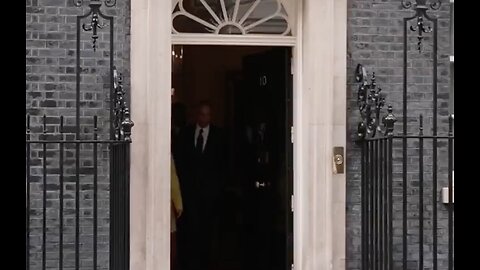 Obama exits 10 Downing Street accompanied by Surprise Guest