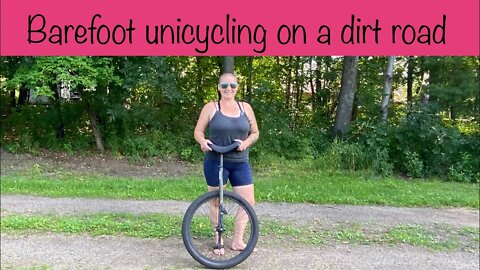 Barefoot unicycling on a dirt road