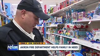 Akron firefighters adopt struggling family with 6 kids for Christmas