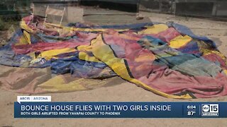 Two children injured after bounce house flies 20+ feet in the air