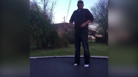A Man Flip On A Trampoline And Rips It