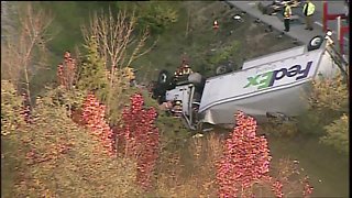 FedEx truck driver trapped, rescued after crash on I-275