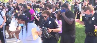 Police join protesters for the 'Cupid Shuffle'