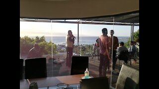 Seven activists occupying a mansion in Camps Bay have until midday of Thursday