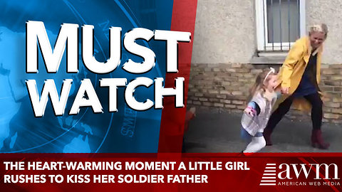 The heart-warming moment a little girl rushes to kiss her soldier father