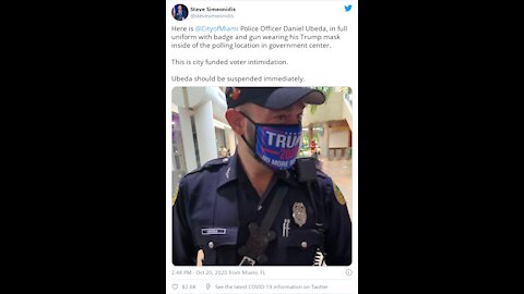 Voter Intimidation: Photo Shows Uniformed Cop Wearing Pro-Trump Mask At Miami Polling Plac