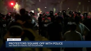 Protestors square off with Phoenix police after peaceful vigil for slain father