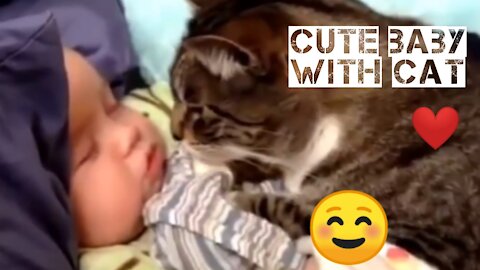 Cute small baby with cat 🐈.