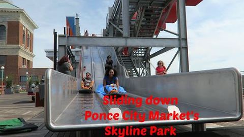 Sliding down Ponce City Market at Skyline Atlanta