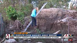 Kansas family stuck after bridge washes away from home