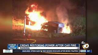 Crews restoring power after car fire