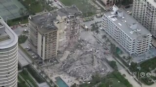 Crews working 'around the clock' searching rubble in condo building collapse