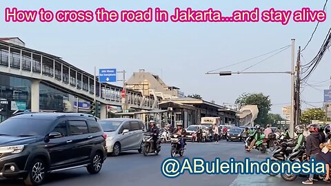 Crossing the road in Jakarta