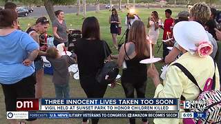 Candlelight vigil at park for 3 dead children