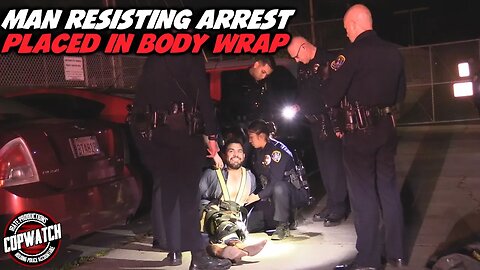 Man Resisting Arrest Placed in Body Wrap | Officer Injured | Copwatch