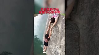 Chinese Girl About To Fall To Her Certain Death