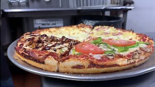 East Lansing pizza restaurants surprised by celebrity visit