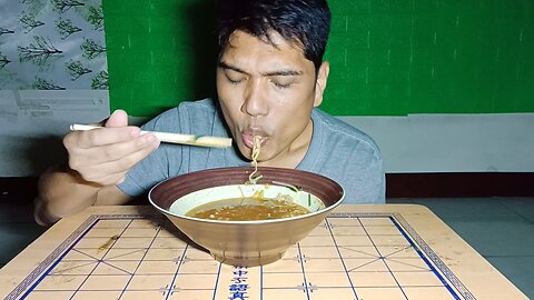 Eating large bowl of Taiwanese Beef Ramen