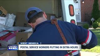 Postal workers putting in extra hours