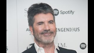 Simon Cowell is on the mend after breaking his back