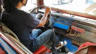 Jeepney driver only uses feet to shift