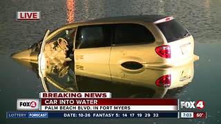 Van partially submerged in retention pond at Fort Myers school