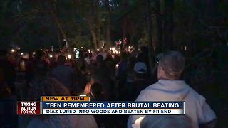 Candlelight vigil for teen beaten to death with baseball bat ends in the woods where he was killed