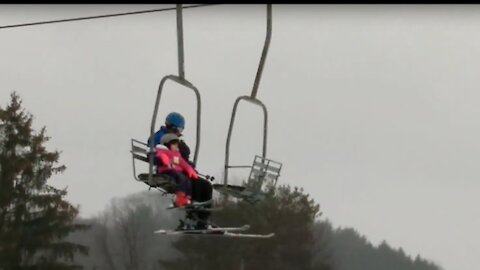 A 4 year old girl's first time on ski lift and skiing on bigger hill