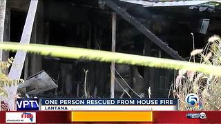 One person rescued from house fire in Lantana