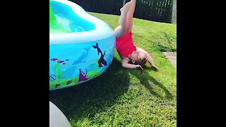 Little Girl Fails Hilariously To Jump In The Pool