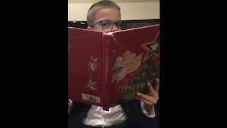 Gifted Child plays Silent Night on the piano