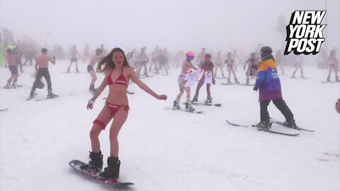 Skiing in skivvies: Half-naked snow bunnies hit the slopes